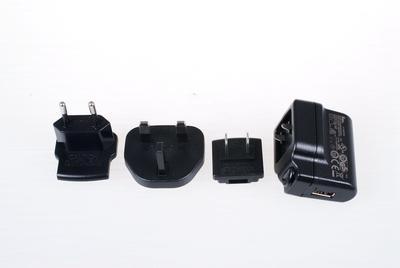Power adaptor 5V/1A incl. EU,US,UK plug, black